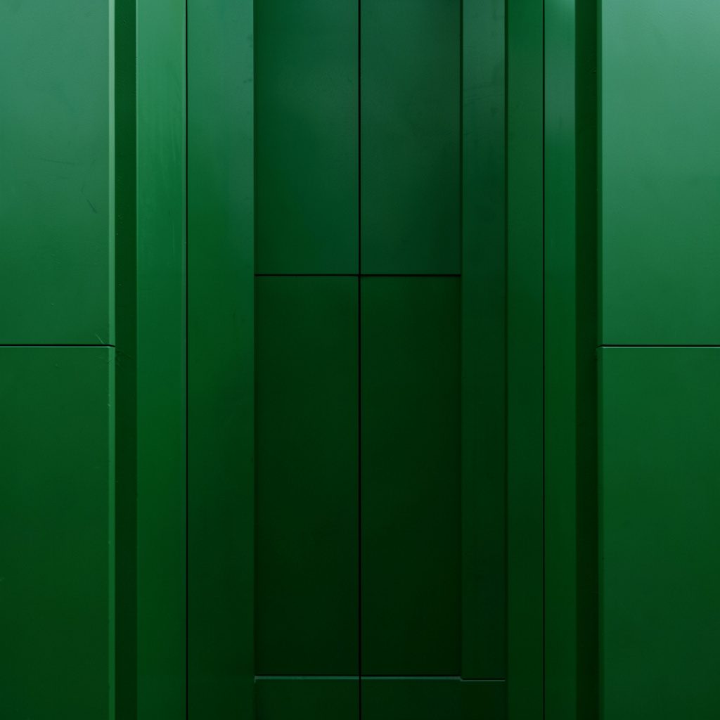 Dark blue and emerald abstract gaming artwork with a dynamic, modern mood